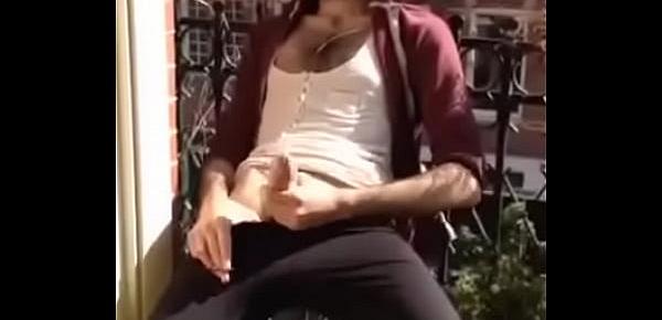  Italian with a massive cock jerking on balcony